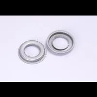 Two metal grommets on white background