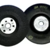 Two abrasive grinding discs side by side