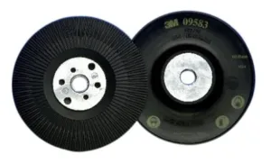 Two abrasive grinding discs side by side