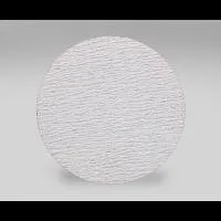 Round textured white object on gray background.