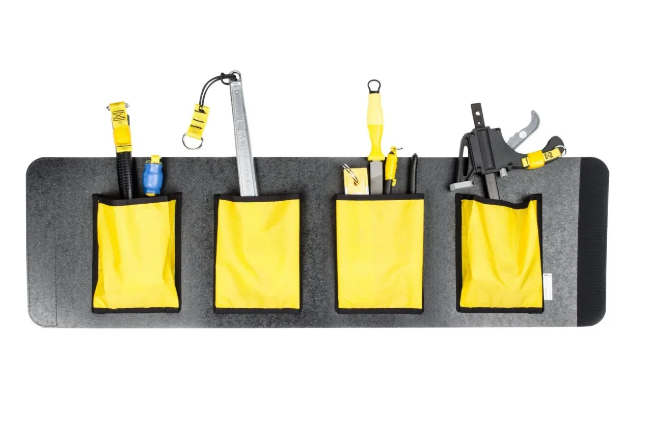 Wall-mounted tool organizer with four yellow pockets