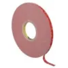 Roll of red double-sided adhesive tape