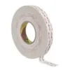 Roll of double-sided adhesive tape.