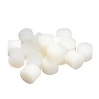 White cylindrical rubber stoppers on white background