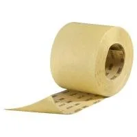 Roll of beige adhesive tape on white background.