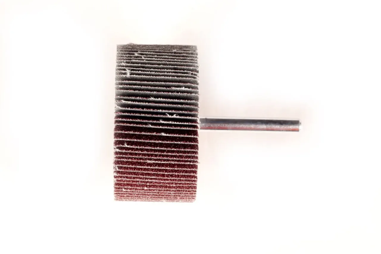 Abrasive flap wheel with metal shank.