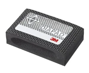 3M DIAPAD abrasive pad for sanding surfaces.