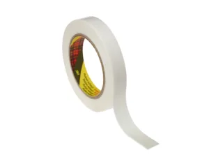 Roll of white adhesive tape unraveling