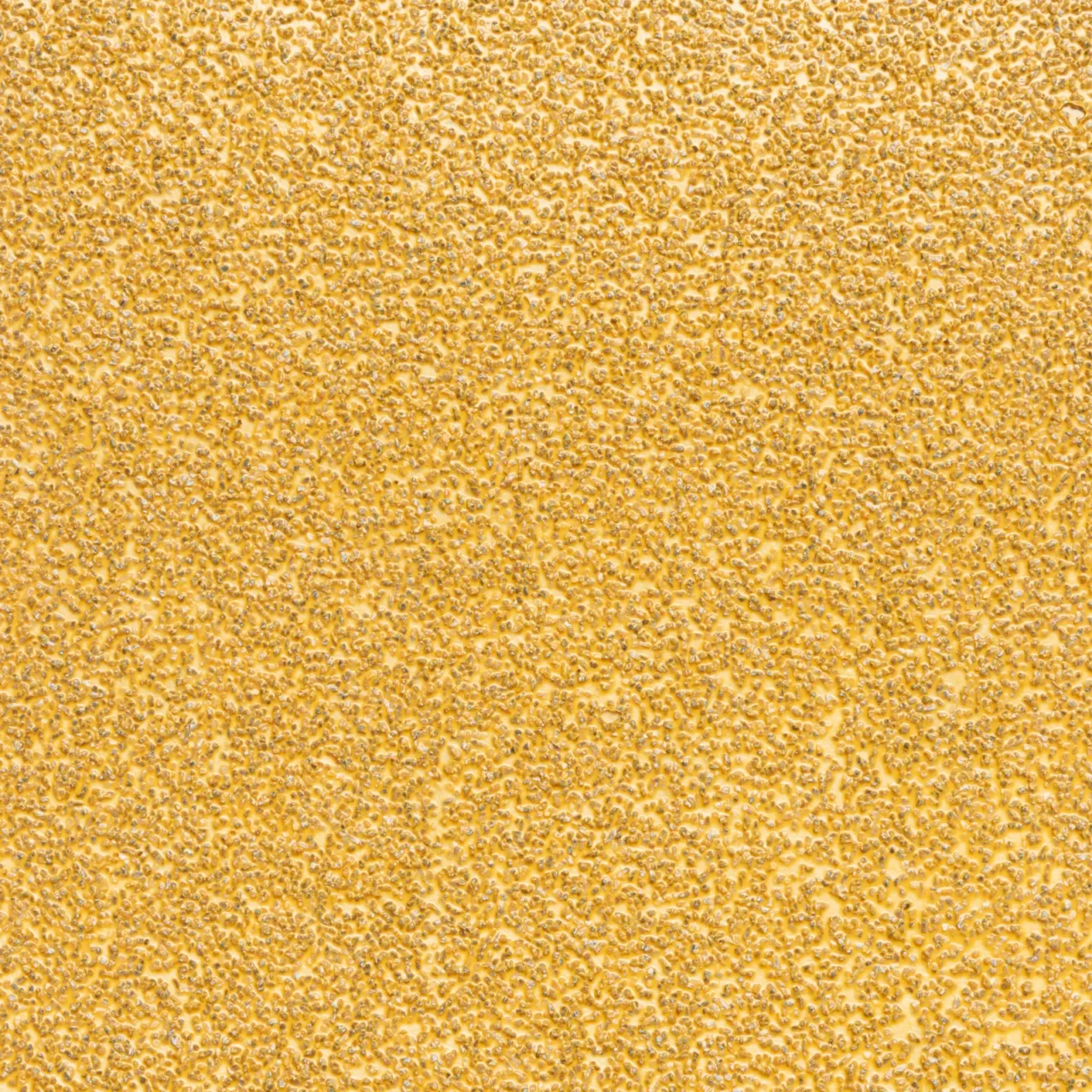 Close-up of golden textured surface pattern