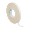Roll of double-sided adhesive tape.