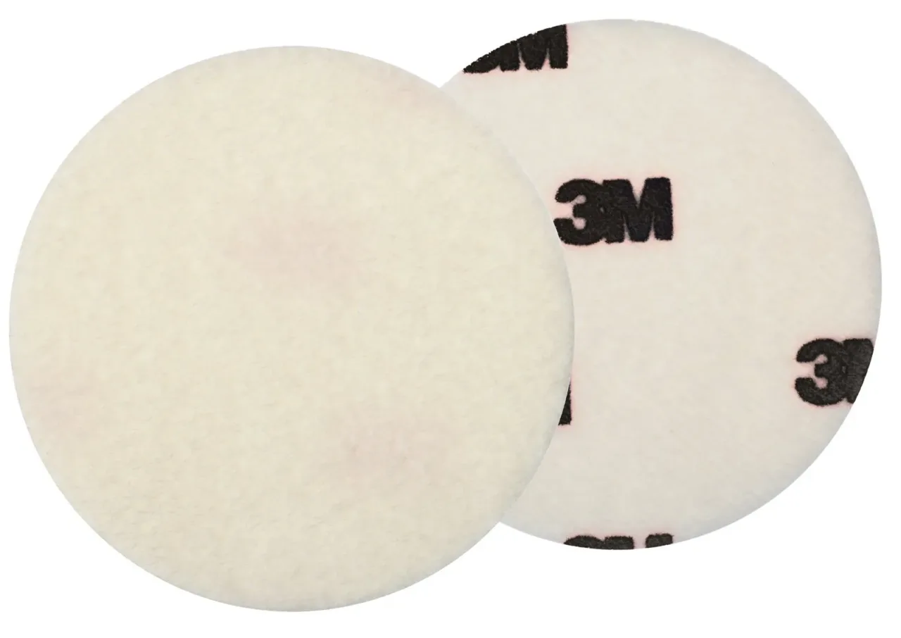 Two white 3M floor pads side by side.