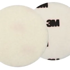 Two white 3M floor pads side by side.