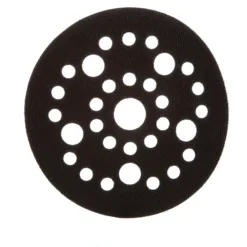Circular sanding disc with multiple holes.