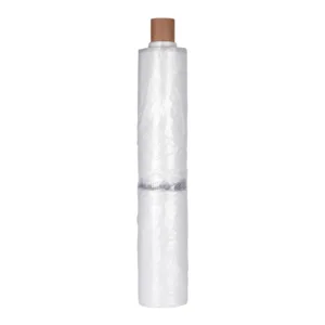 Clear plastic wrap roll on white background.