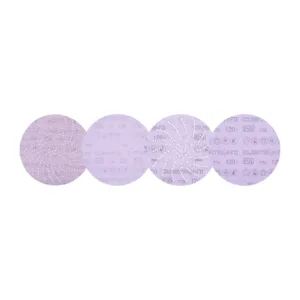 Four round purple sanding discs on white background.
