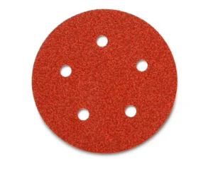 Red round sandpaper disc with seven holes