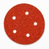 Red sanding disc with five holes