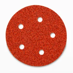 Red sanding disc with five holes