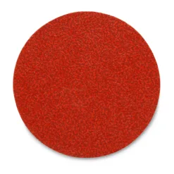 Red abrasive disc on white background