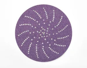 Purple abrasive sanding disc with spiral holes pattern.