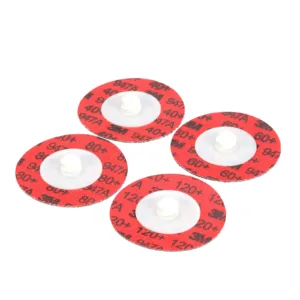 Red 3M sanding discs with white attachments.