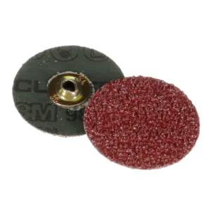 Red abrasive sanding discs on white background.