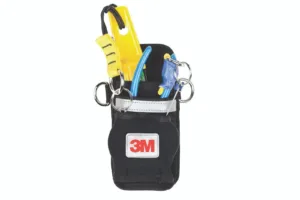 Tool pouch with various safety tools and accessories.