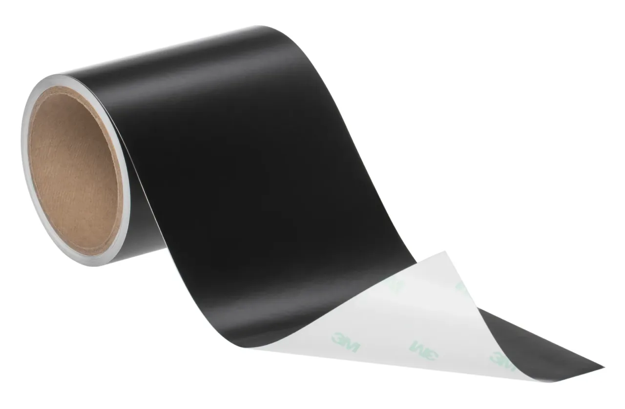 Black adhesive tape roll on white background