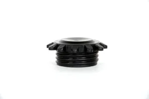 Black plastic gear-shaped oil plug