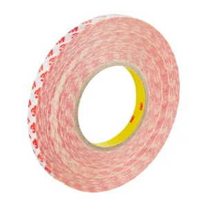 Roll of red patterned adhesive tape