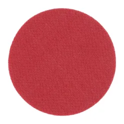 Red circular sandpaper with textured surface.