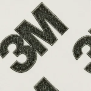 Close-up of black 3M logo on white background.