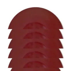 Red vinyl records stacked in a pattern.