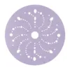 Purple sandpaper disc with perforated design pattern.