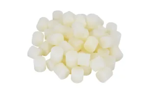 Pile of small, white cylindrical objects