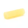 Yellow cylindrical beeswax block on white background.