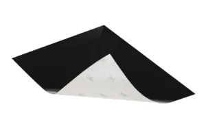 Black adhesive sheet with one corner lifted