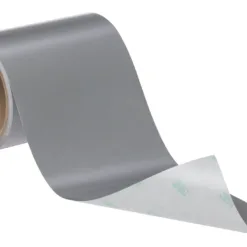 Roll of gray adhesive tape with backing
