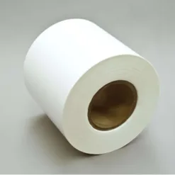 Large roll of white paper on table
