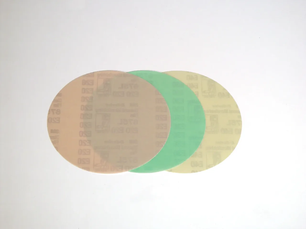 Three overlapping translucent discs on white background.