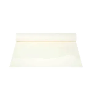 Roll of white paper unrolling flat