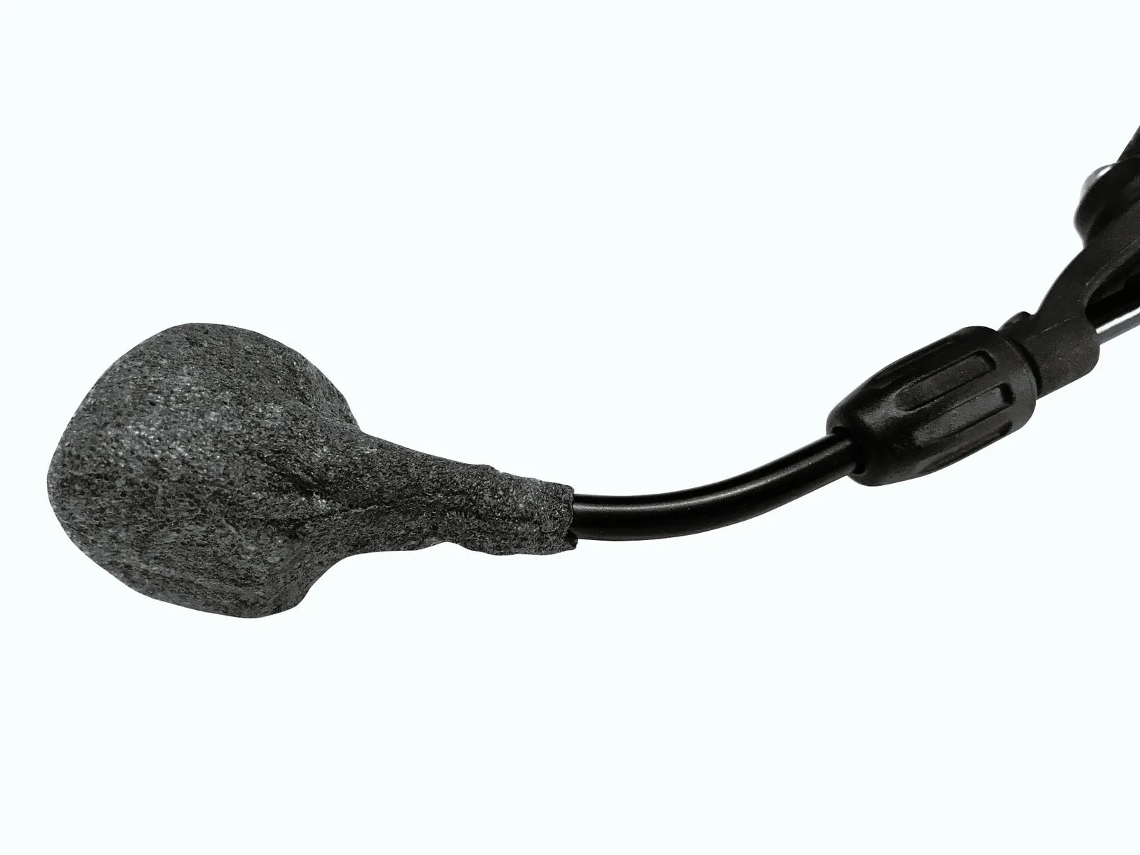 Black foam microphone windscreen on boom arm