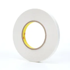 Roll of white adhesive tape on white background.