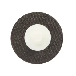 Close-up of round abrasive grinding wheel disc