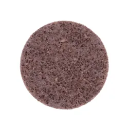 Brown scouring pad for cleaning surfaces.