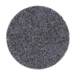 Black abrasive scouring pad on white background.