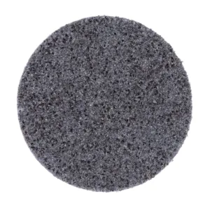 Black abrasive scouring pad on white background.