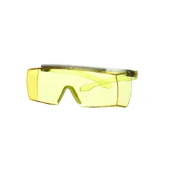 Yellow safety goggles on white background