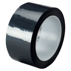 Black adhesive tape roll on white background.