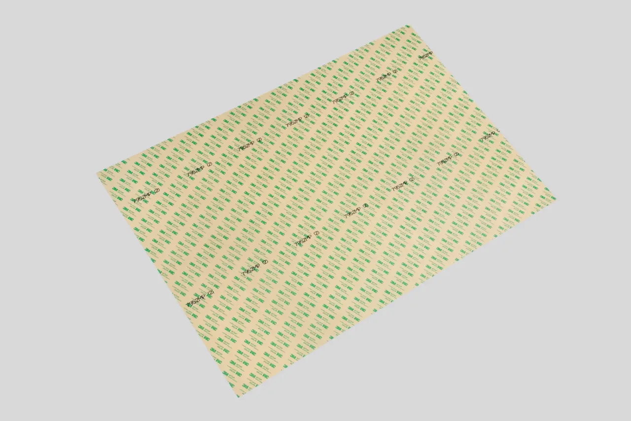 Sheet of adhesive backing paper